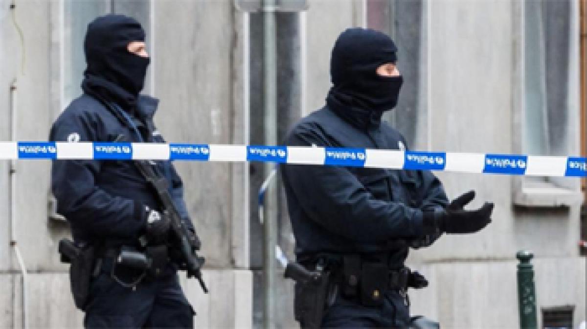 Shots fired at Brussels police in raid linked to Paris attacks